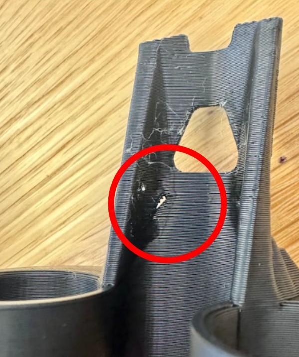 Closeup of eating tool loft with a break due to being too thin