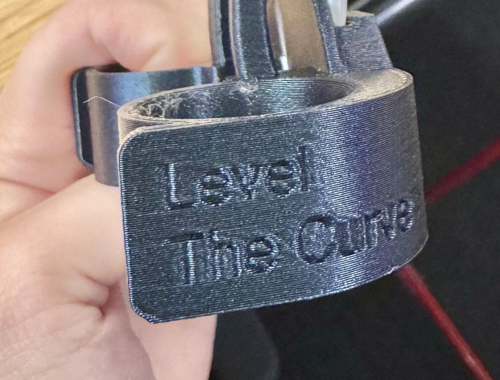 Eating tool with Level The Curve wording logo